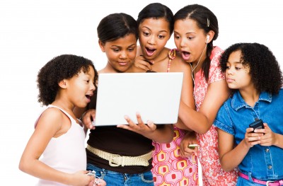 Middle School girls looking at a computer
