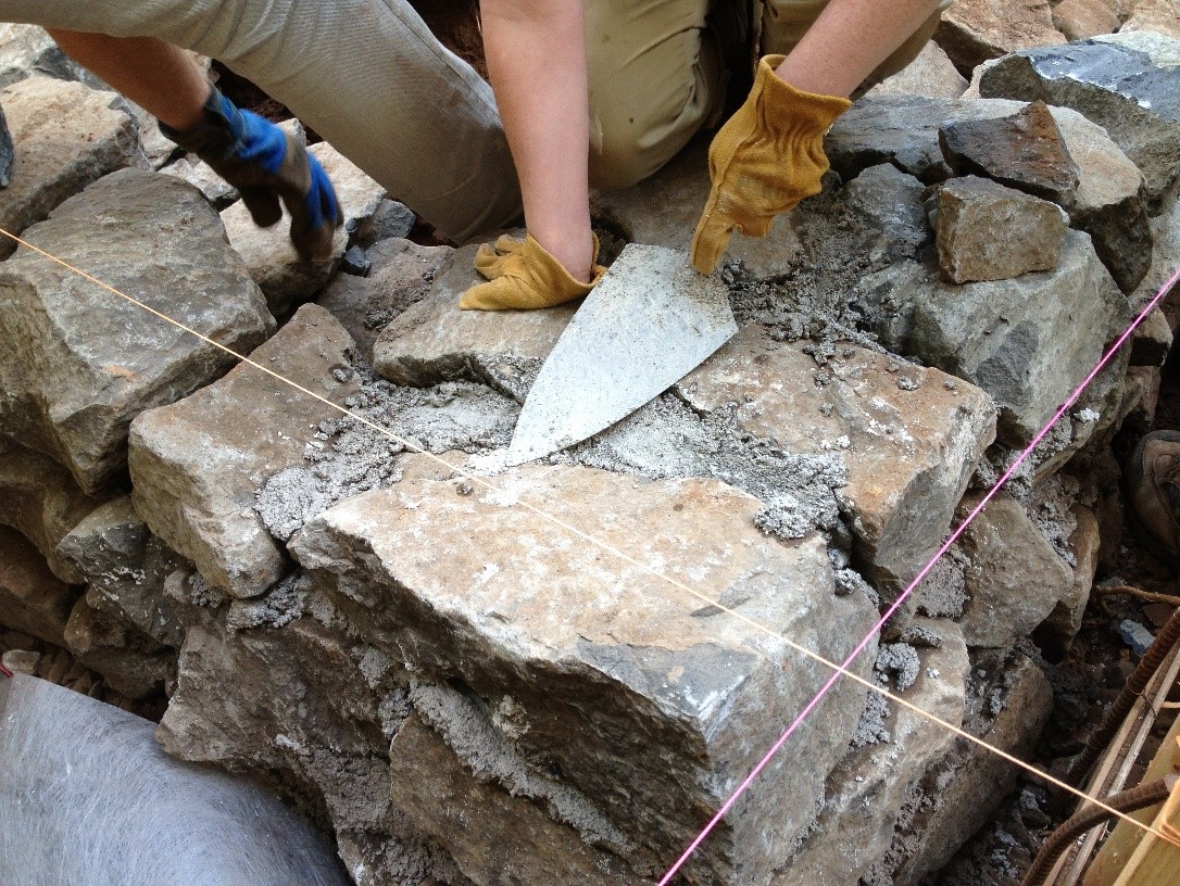 Foundation stones with trowel